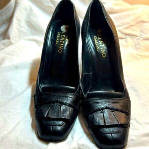 Black 4 inch Valentino Garavani heels with loafer details